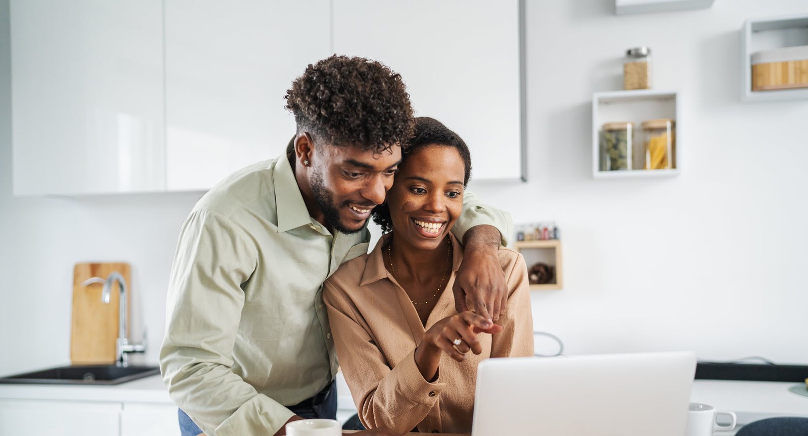 couple looking at a laptop